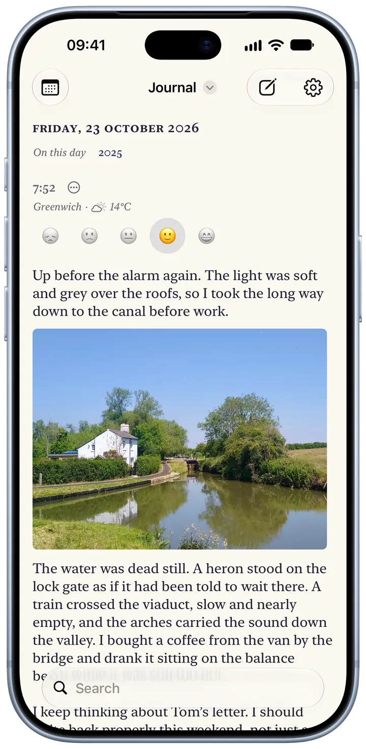 Today’s page in Bifolio on an iPhone, Friday 23 October 2026: an entry from 7:52 in Greenwich, 14°C and partly cloudy, a smile picked for the mood, a short paragraph about an early walk, and a photo of a white cottage beside a canal lock.