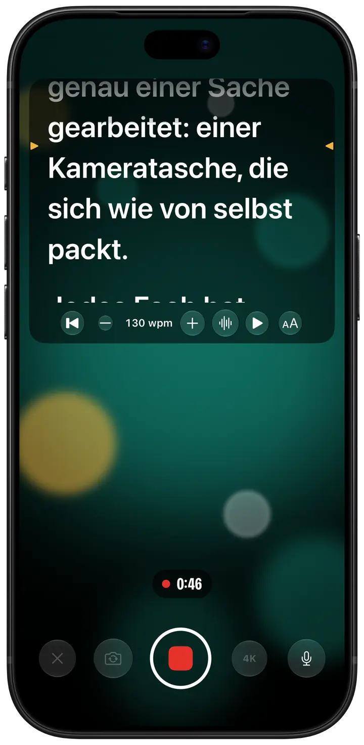 Eyeline beim Filmen auf dem iPhone: Das Skript läuft in einem Feld oben auf dem Bildschirm, direkt unter der Kamera, mit bernsteinfarbenen Markierungen links und rechts der Zeile zum Ablesen, über dem Timer und der Aufnahmetaste.