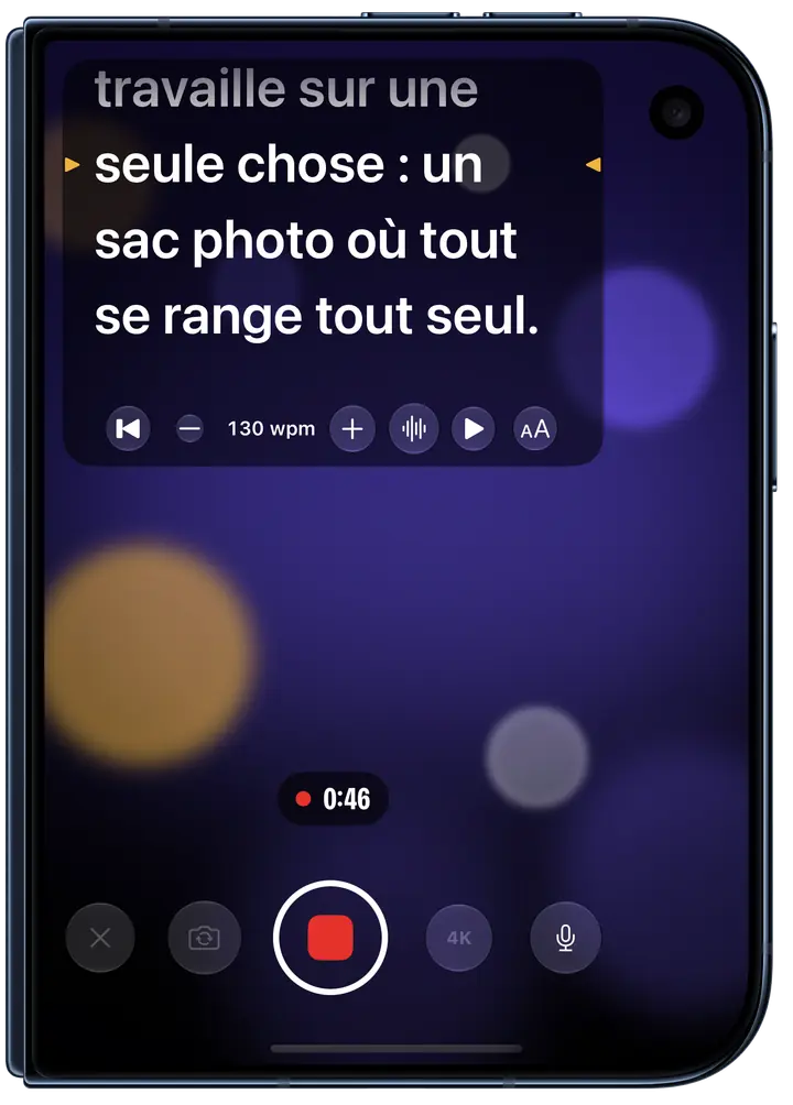 Eyeline en plein enregistrement sur l’écran externe d’un iPhone Duo plié : le texte juste sous la caméra avant, la ligne à lire marquée en ambre, à 130 mots par minute, la prise à 0:46.