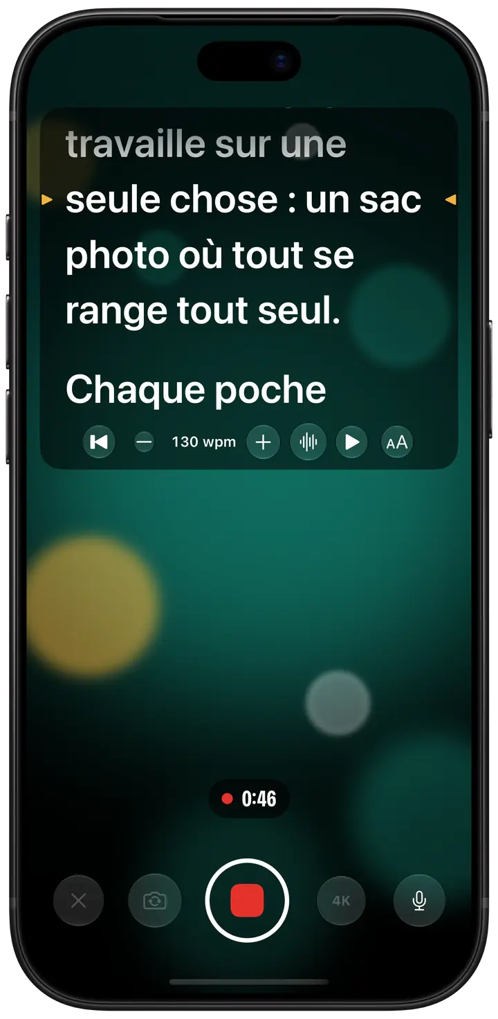 Eyeline en plein enregistrement sur iPhone : le texte défile dans un panneau en haut de l’écran, juste sous la caméra, avec des repères ambrés de part et d’autre de la ligne à lire, au-dessus du chrono et du bouton d’enregistrement.