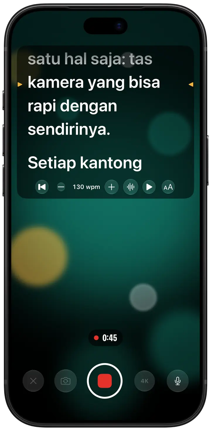 Eyeline merekam di iPhone: naskah bergulir dalam panel di bagian atas layar, tepat di bawah kamera, dengan tanda kuning di kedua sisi baris yang dibaca, di atas pengatur waktu dan tombol rekam.