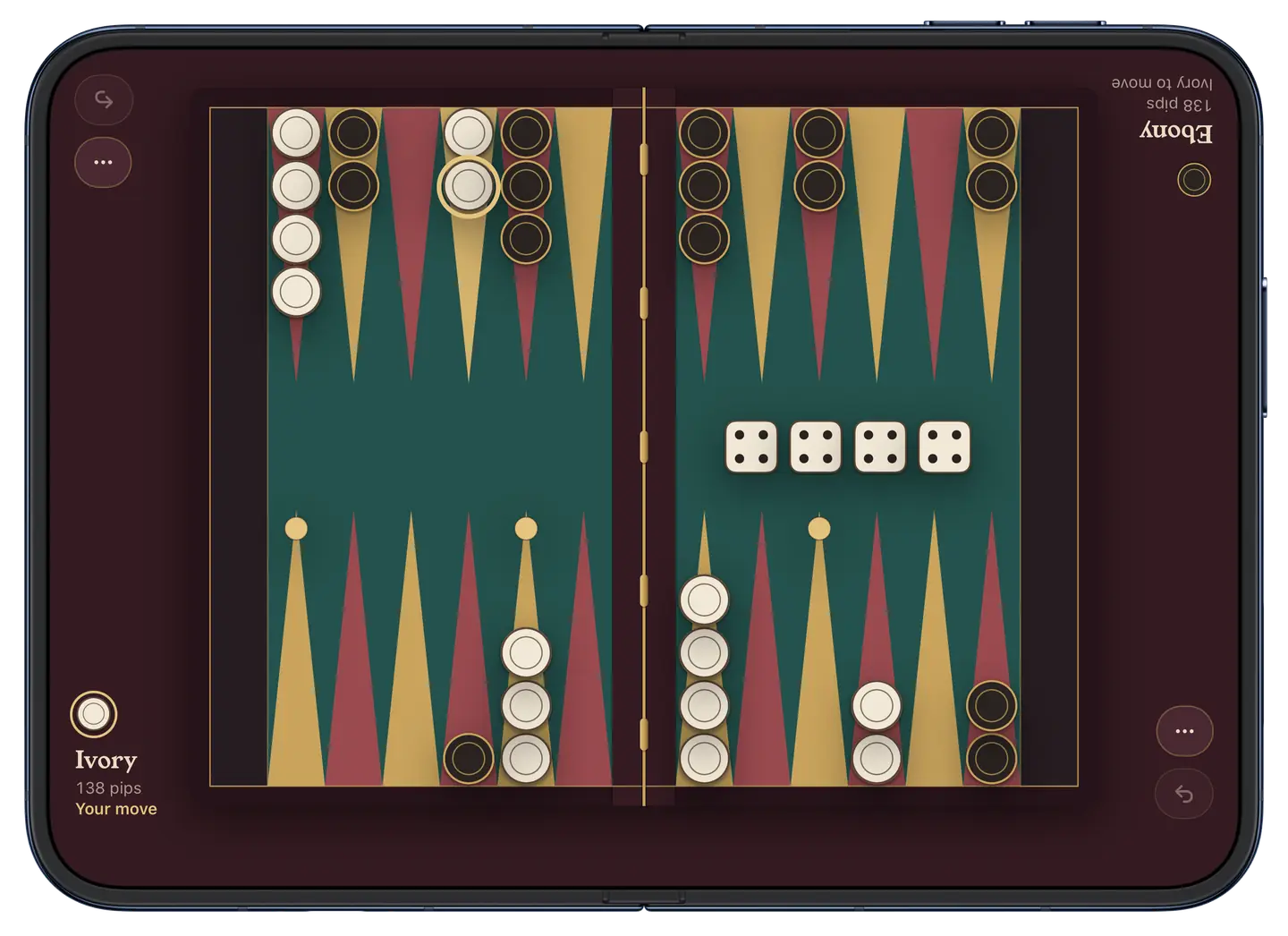 A board game open across the fold of iPhone Duo, its brass hinge on the crease